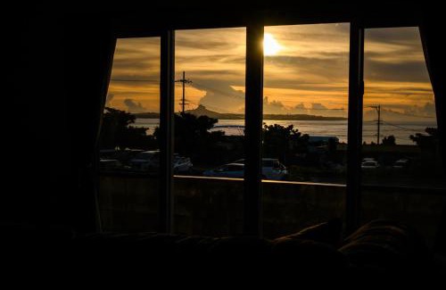 Bise Apartment | Ocean View Terrace: Family-Friendly Getaway Awaits You