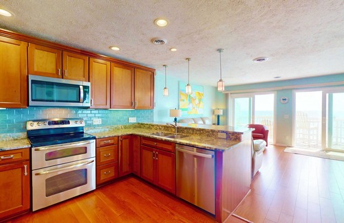 Kure Beach Condo | Oceanfront 2-Story Retreat with Pools and Hot Tub