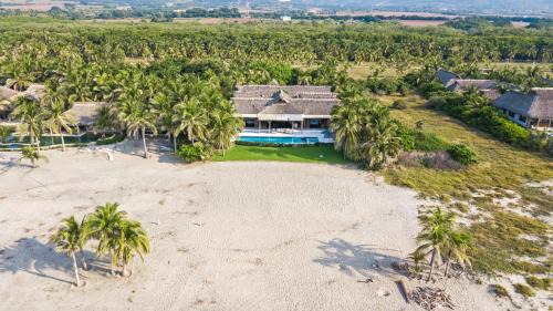 Barra de Colotepec Villa | Oceanfront Casa Rhino: Guest Rated 9.8 with Private Beach