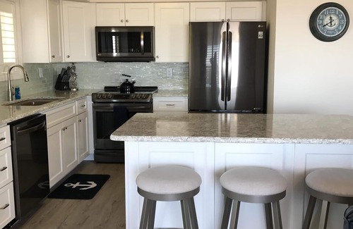Ocean City Condo | Oceanfront Condo! Enjoy direct access to Boardwalk, the beach or walk to venues.