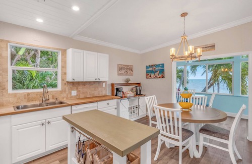 Tavernier House | Oceanfront Estate with Private Pier & Heated Pool Access