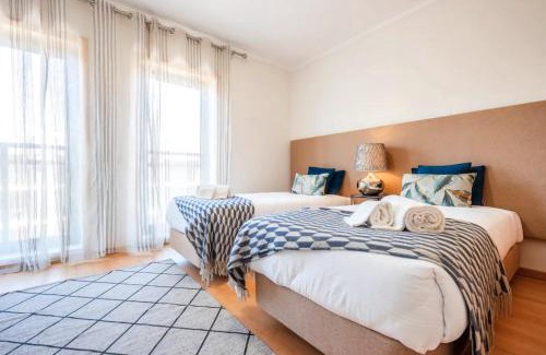 Olhao Apartment | Oceanfront Getaway: Breathtaking Views & Inviting Pool