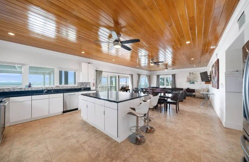 George Town House | Oceanfront Mansion with Heated Infinity Pool & Spa
