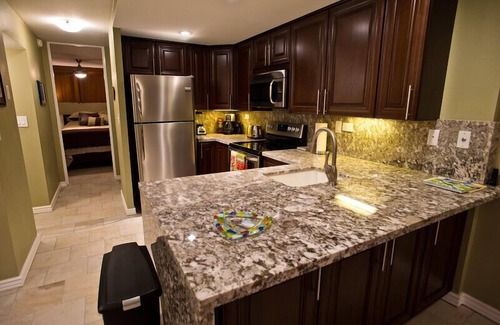 Historic Kailua Village Condo | Oceanfront One Bedroom Condo with Pool and Spa Retreat