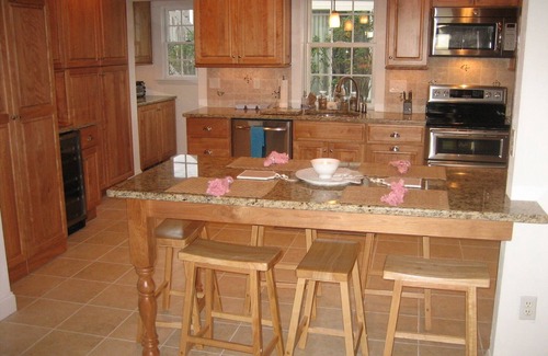 West Yarmouth House | Oceanfront Retreat with Windsurfers and Spa Amenities