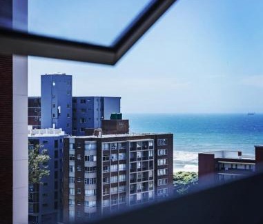 North Beach Apartment | Oceanic Unit 122: Beachfront Bliss with Pool & Ocean Views