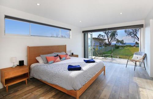 Culburra Beach House | Pet Friendly Oceanside Retreat with Absolute Beachfront Access