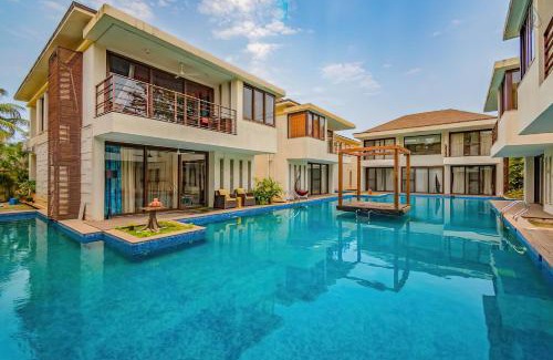 Vagator Villa | Elegantly Designed Ochre Villa in Assagaon with Ocean View