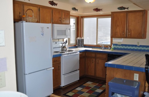 Bayshore House | Oceanfront Escape with Fireplace, Hot Tub & Pet Friendly