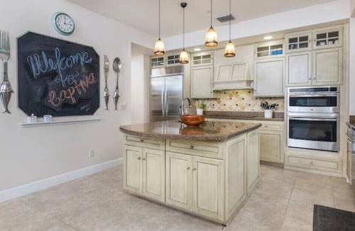Wulfert House | Beach Access with Pool, Spa & Free Boat Ride Included