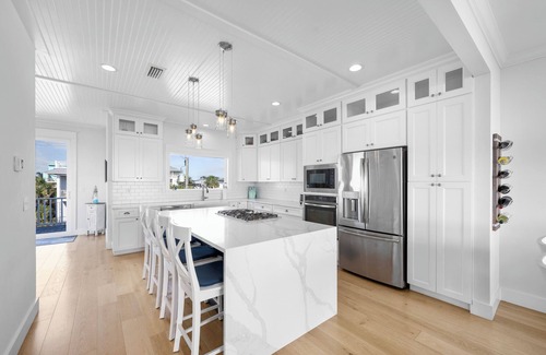 Butler Beach House | Oceanfront Paradise with Game Room, Heated Pool & Firepit