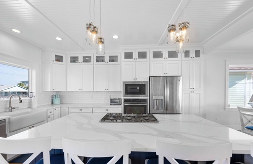 Butler Beach House | Oceanfront Paradise with Game Room, Heated Pool & Firepit