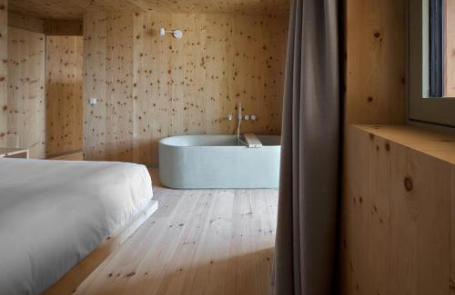 Bressanone Apartment | Idyllic Odles Lodge: Oceanfront Bliss with Spa & Pool