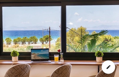 Petaloudes Apartment | Oceanfront Odyssey: Relax in a Jacuzzi by the Beach