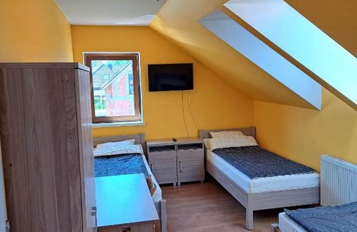 Kobierzyce Apartment | Child-Friendly Ogrodowe Noclegi with Kitchen Amenities