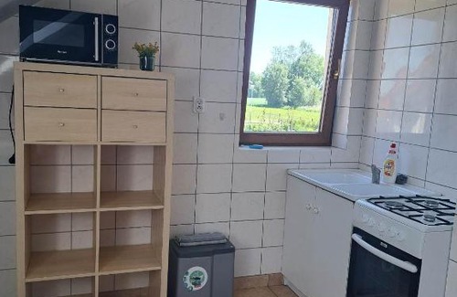 Kobierzyce Apartment | Child-Friendly Ogrodowe Noclegi with Kitchen Amenities