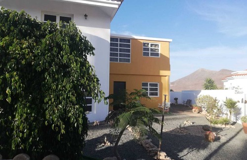 Tarajalejo Apartment | Discover Ohana Roger: 10/10 Rated Stay with Kitchen Amenities