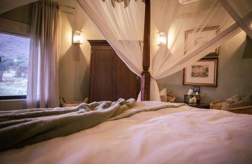 Windhoek Cabin | Discover Okapuka Safari Lodge: Guest Rated 9.8/10 Experience