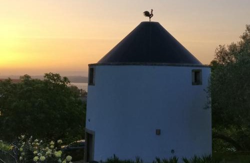 Caparica Bed & Breakfast | Beautiful Windmill in Belém with Ocean Views & Pool