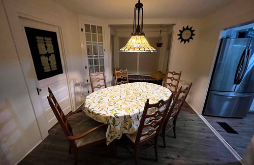 Eustis House | Discover Timeless Old Florida Charm with Top-Rated Amenities