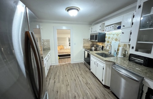 Eustis House | Discover Timeless Old Florida Charm with Top-Rated Amenities