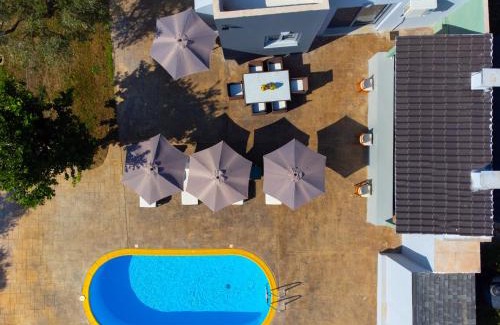 Voia House | Idyllic Old Olive Tree Cottage with Oceanfront Pool