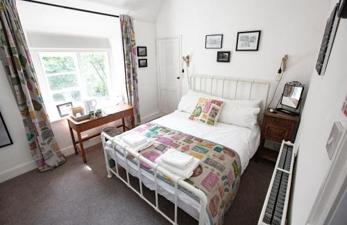 Milton Keynes House | Discover Old School Wolverton: Pet-Friendly Retreat Awaits