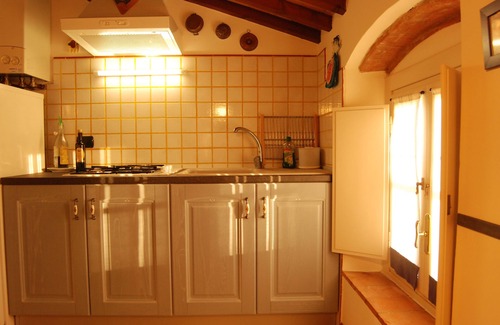 San Ginese Apartment | Quaint Stone Farmhouse with Pool Near Lucca, Tuscany