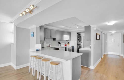 Meadows Condo | Modern Waterfront Corner Condo with Ocean View & Pool