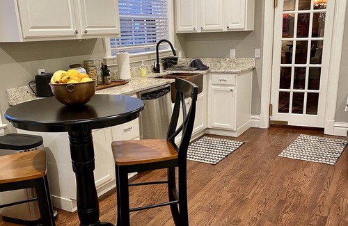 Cherry Creek House | Elegant Old World Flat with Kitchen in Upscale Area