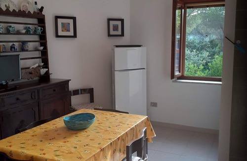 Cala Liberotto Apartment | Beachfront Oleander Apartment with Pool and Ocean View