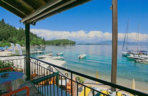 Agni Apartment | Beachfront Olgas Cottage: Family-Friendly Getaway Awaits
