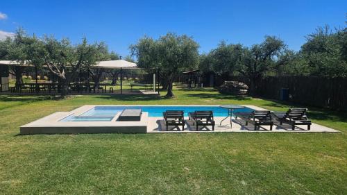 Bajo Lunlunta Resort | OlivaNegra Resort: Oceanfront Retreat with Pool & Breakfast