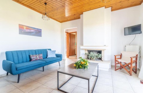 Malevizi Apartment | Beachside Olive Apartment: Child-Friendly Retreat Awaits