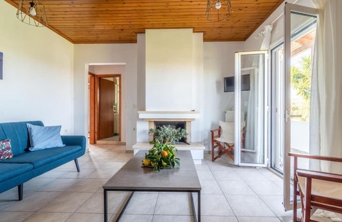 Malevizi Apartment | Beachside Olive Apartment: Child-Friendly Retreat Awaits