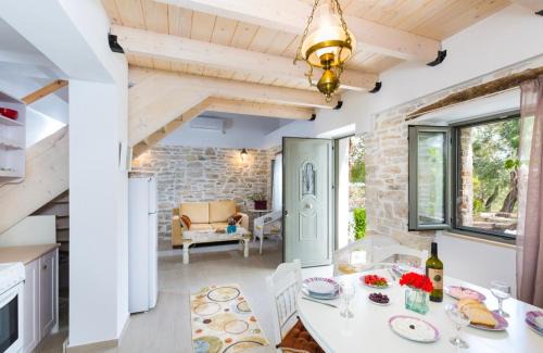 Lakka Villa | Cozy Olive Cottage with Oceanfront Views and Family Amenities