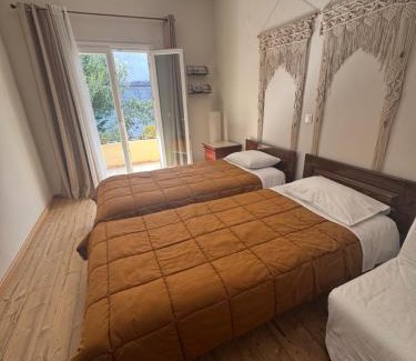 Acharavi House | Cozy Olive Garden Studios: Oceanfront Bliss Awaits You