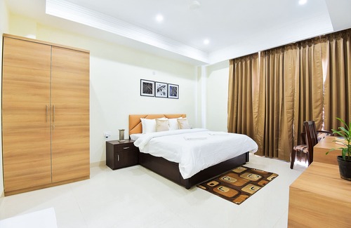 Gurugram Apartment | Inviting Olive Studio with Gym and Balcony Garden Access