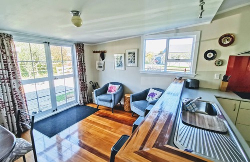 Martinborough Cottage | Exceptional Olive Tree Cottage with Ocean View in Martinborough