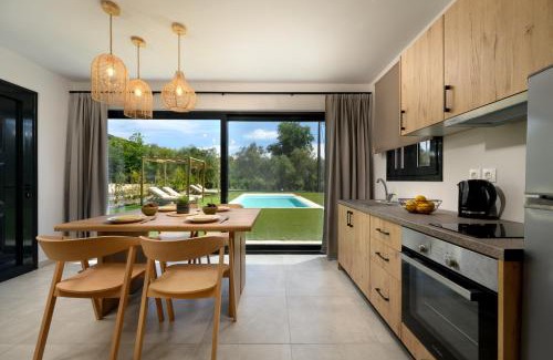 Dafnata Villa | Relax at Olive Trees Villas with Pool and Oceanfront Views
