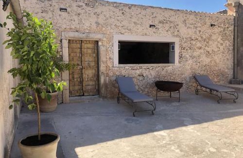 Noto House | Discover Oliveraie de Caractère: 4-Star Family Retreat