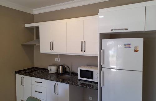 Oludeniz House | Explore Oludeniz: Mountain Views & Family-Friendly Amenities