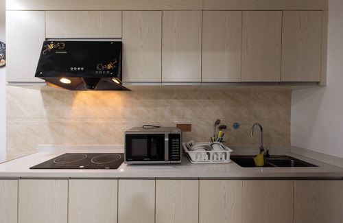 Sangkat Veal Vong Apartment | Discover Olympia City Suite: Family-Friendly with Kitchen