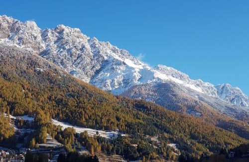 Bormio Apartment | Olympic Chalet 12: Pet-Friendly Retreat with Perfect Score