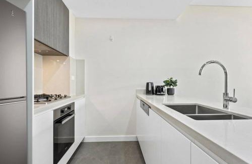 Lidcombe Apartment | Inviting Resort Living: One Bedroom Apt at Olympic Park