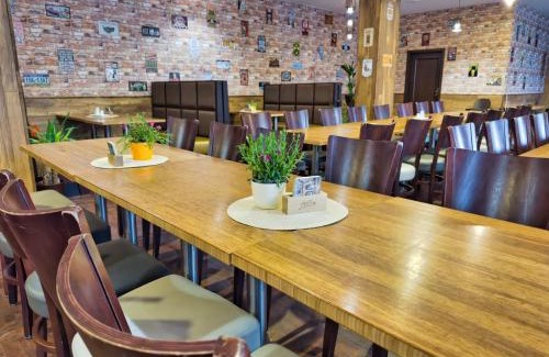 Trutnov Hotel | Discover Olympland Hotel: Family-Friendly with Pool & Hot Tub