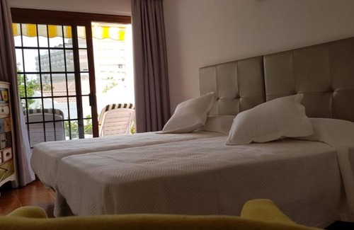 San Eugenio Apartment | Oceanfront Olympus Apartment with Pool and Perfect Rating