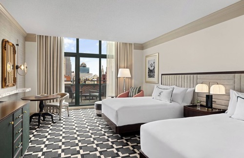 Wholesale District Hotel | Relax at Omni Severin Hotel with Pool, Spa & Family Amenities
