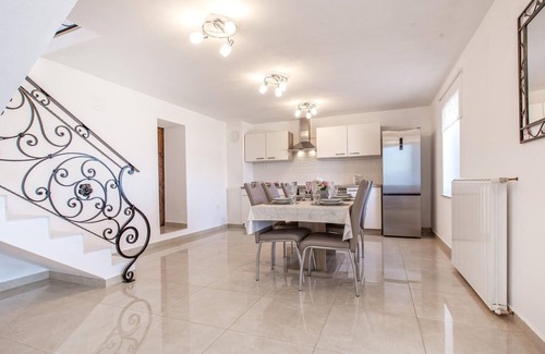 Koper House | On the Adriatic coast of Slovenia, this comfortable vacation home with swimming pool and sea view we