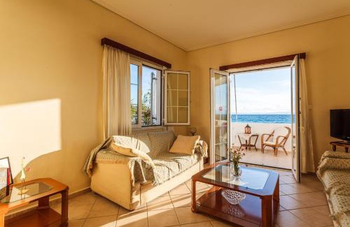 Akrogialion Apartment | Beachfront Akroyali Family Home with Breakfast & Kids Fun